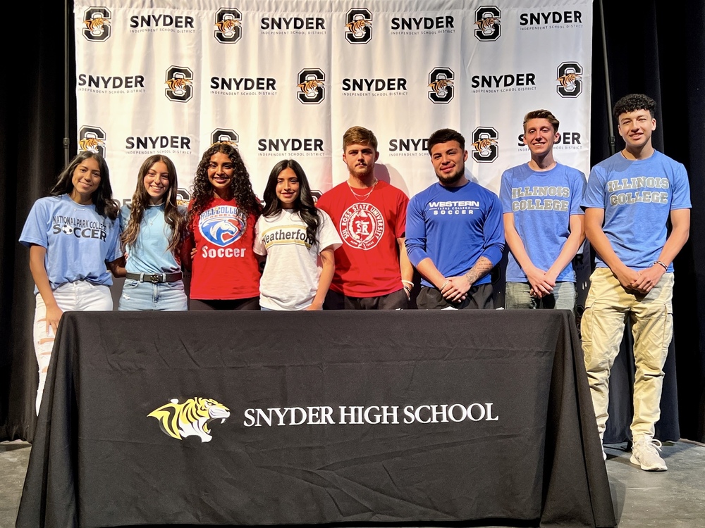 Eight Athletes Sign to Play Sports in College