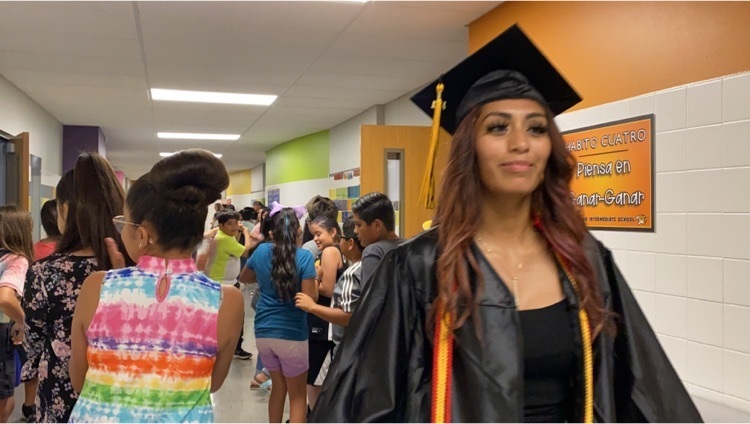 Senior walking through hallway