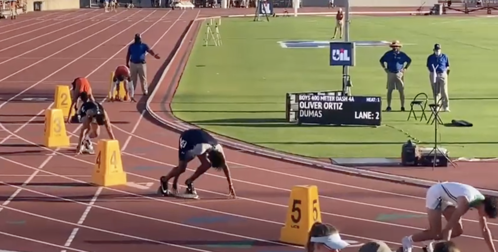 Runners at track meet