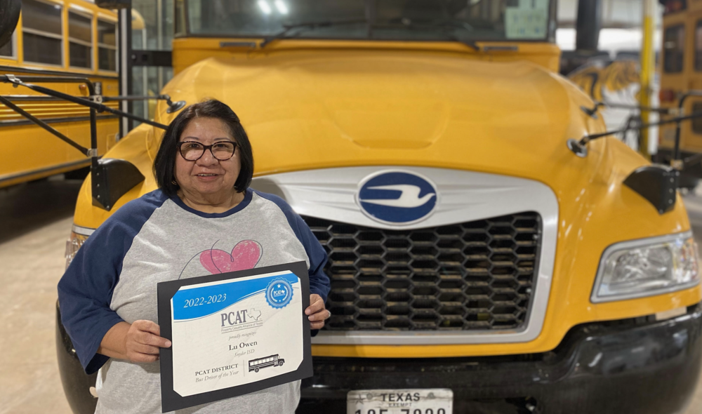 mrs. owen holding certificate