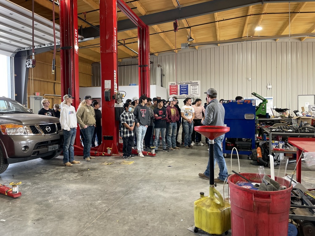 students visit automotive dealership