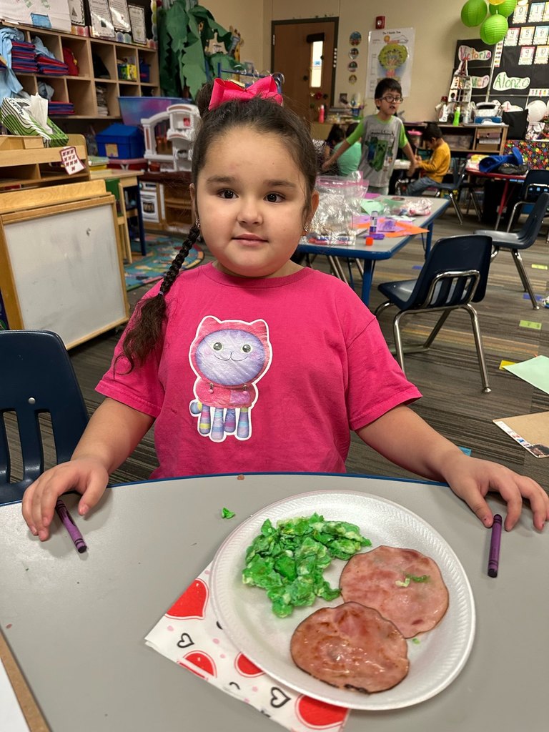 students cooking and eating green eggs and ham