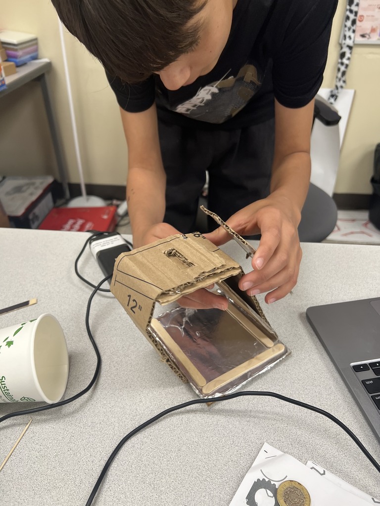 photo of student working on steam project male